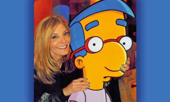 Pamela Hayden poses with Milhouse, one of the characters she has voices on 'The Simpsons' for 35 years. [ph. c/o FOX/20th Television Animation]